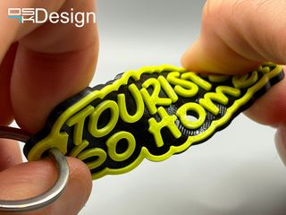 Llavero "Tourists Go Home" en TPU (flexible)