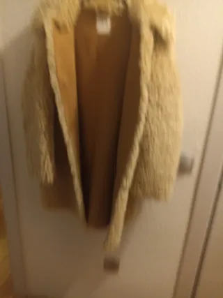 Abrigo pelo largo hasta rodilla