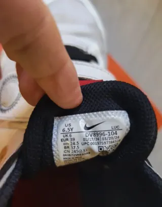 Zapatillas Nike Hustle D11 Oro Blanco