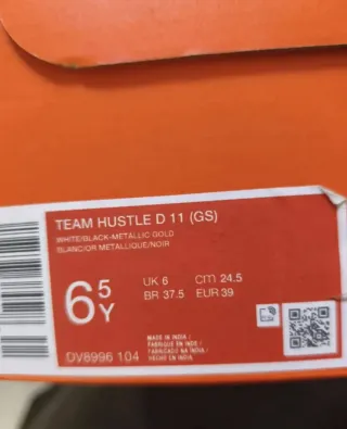 Zapatillas Nike Hustle D11 Oro Blanco