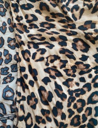 Blusa animal print manga larga