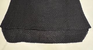 Suéter negro tejido