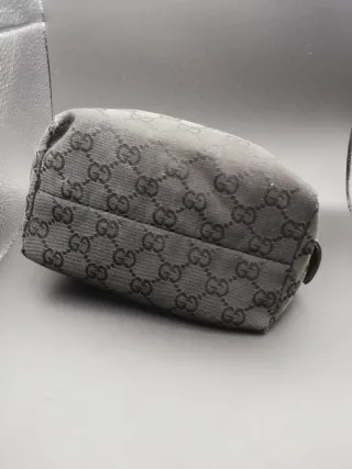 Pochette Gucci da restaurare