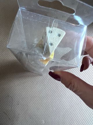 Grattugia con manico a forma di formaggio