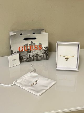 Collana Guess dorata con triangolo