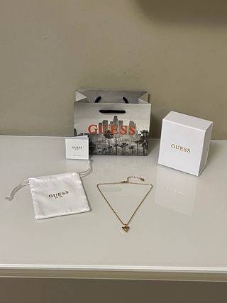 Collana Guess dorata con triangolo