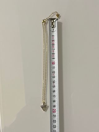 Collana Guess dorata con triangolo