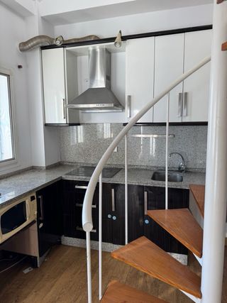 Muebles de Cocina color blanco y negro.