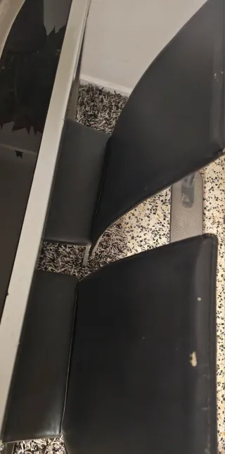 Mesa de cristal extensible con 4 sillas negras