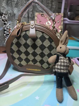 Bolso redondo con estampado de cuadros