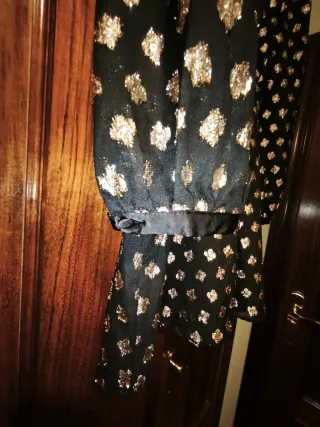 Blusón festivo negro y dorado talla única