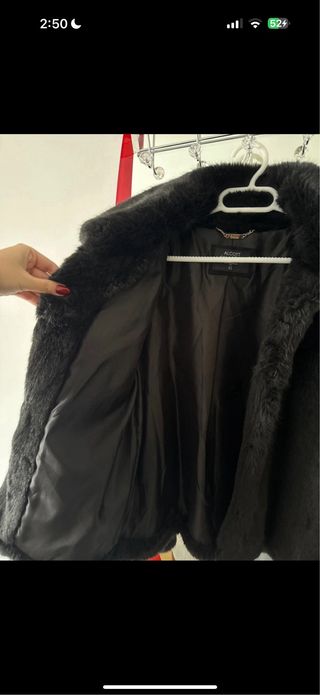 Abrigo de pelo negro