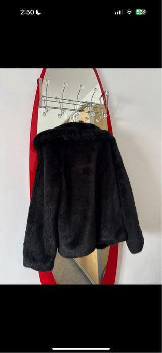 Abrigo de pelo negro