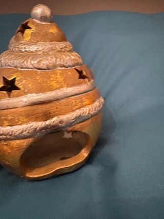 Babbo Natale porta candele oro e argento