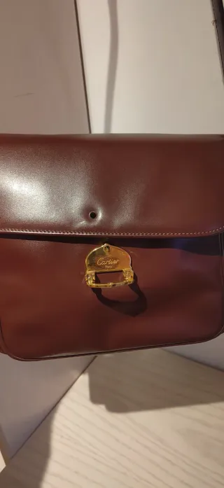 Bolso Cartier Must burdeos bandolera