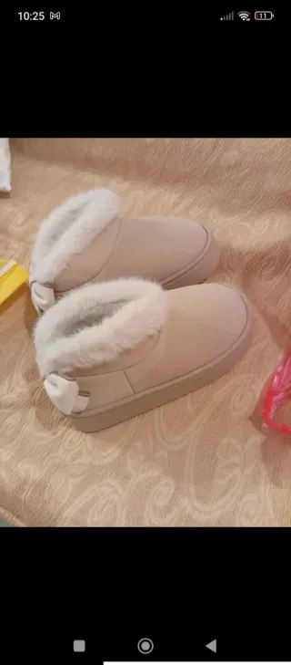 Stivaletti donna con fiocco e pelliccia