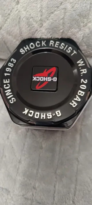 Reloj G-Shock plateado y azul