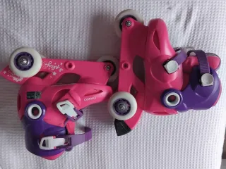 Patines infantiles Oxelo rosas y morados