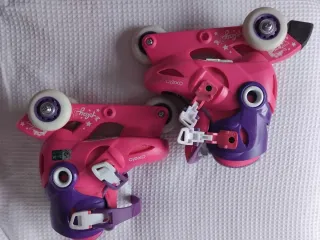 Patines infantiles Oxelo rosas y morados