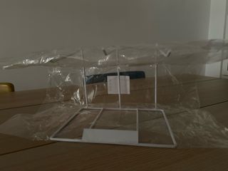 Expositor de hierro blanco para tienda