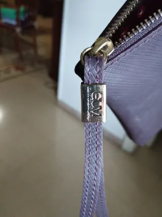 Pochette con borchie marrone e oro