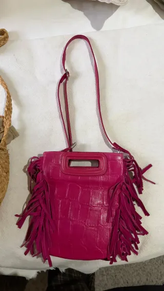 Bolso rosa con flecos