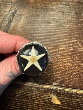 Anello con stella marina