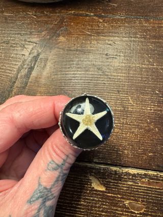 Anello con stella marina