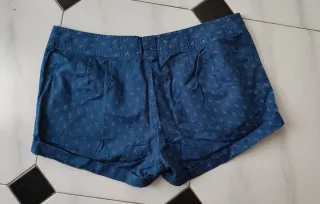 Pantalón palmeras Talla 42, da menos