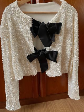 Chaqueta fiesta lentejuelas lazos negros