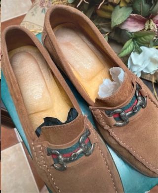 Mocasines de piel marrones con hebilla