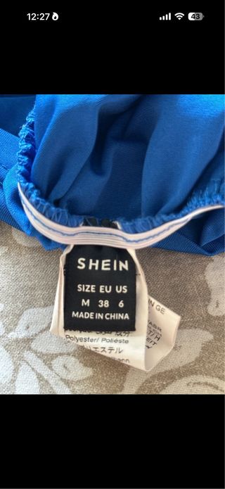 Top asimétrico azul talla M