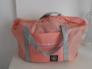 Bolsa de viaje rosa plegable
