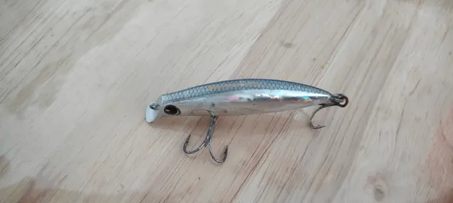 Caña de Spinning SEIKA R18 con carrete y señuelos