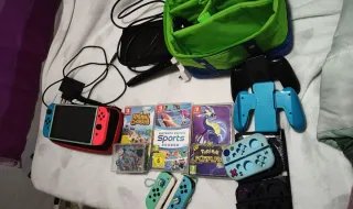 Nintendo Switch OLED + 3 juegos y accesorios