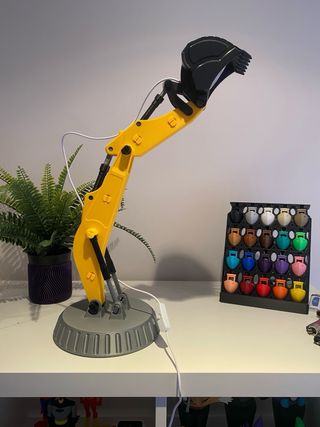 Lámpara excavadora articulada