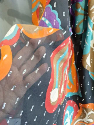 Lote 2 minifaldas estampadas Essentiel y Naf-Naf