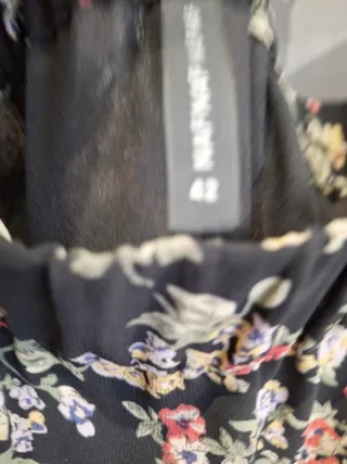 Lote 2 minifaldas estampadas Essentiel y Naf-Naf