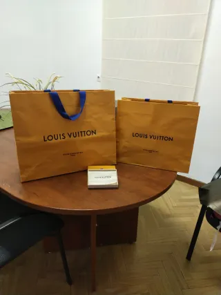 Bolsas y caja para cartera Louis Vuitton Naranja.