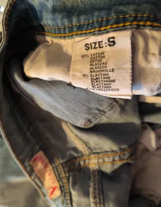 Jeans donna strappati con strass