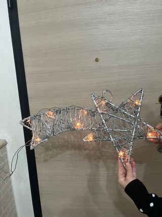 Stella luminosa argento metallo