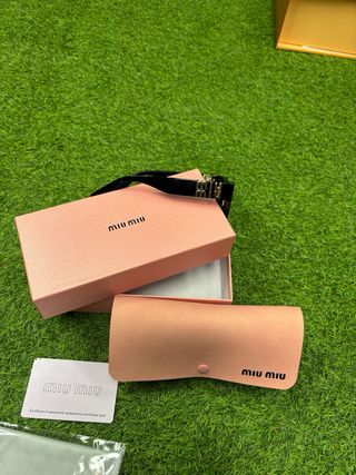 Gafas de sol Miu Miu Negras