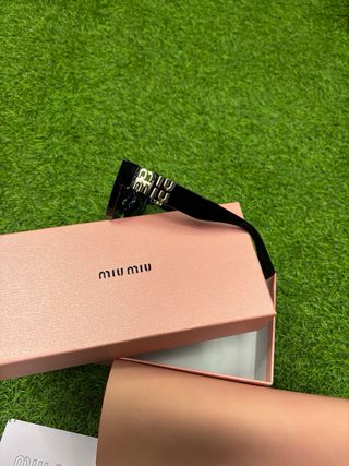 Gafas de sol Miu Miu Negras