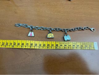 Bracciale con ciondoli a forma di borsa