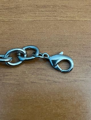 Bracciale con ciondoli a forma di borsa