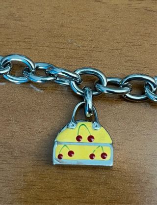 Bracciale con ciondoli a forma di borsa