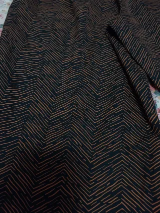 Pantaloni fantasia con spacco