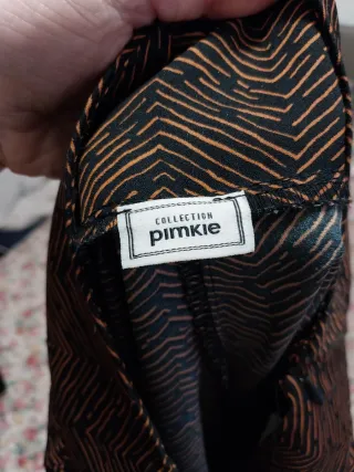 Pantaloni fantasia con spacco