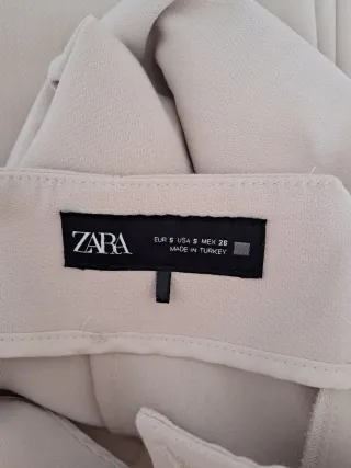 Pantalones beige de talle alto