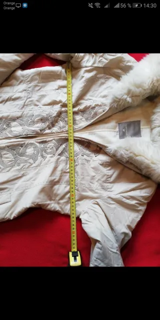 Abrigo de señora con capucha y pelo